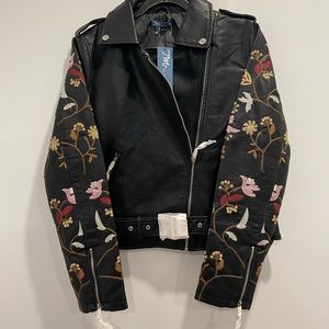 Black vegan leather motorcycle jacket. Sleeve embroidery. Make an offer.